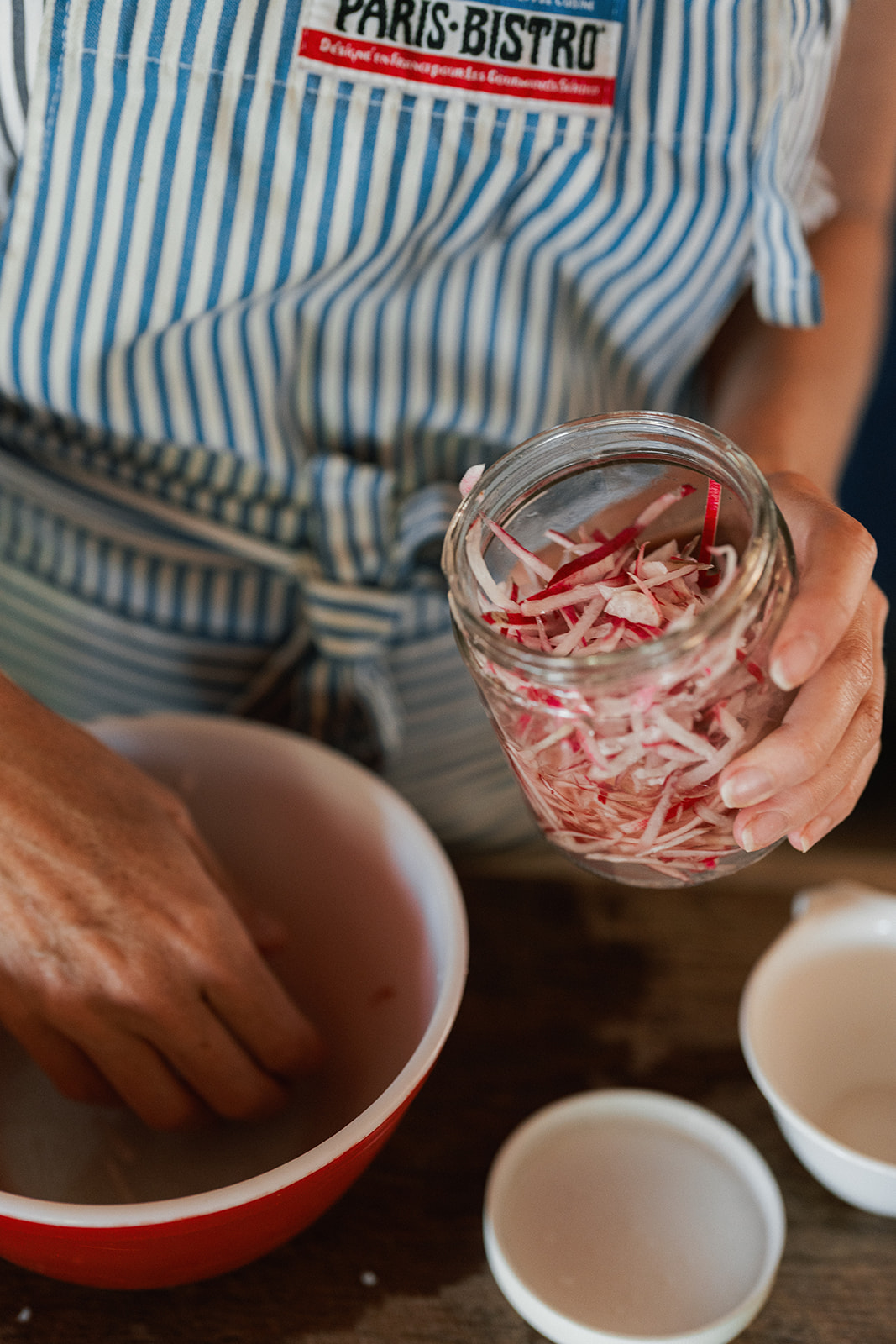 Image of Make the Pickled Radish - combine rice vinegar, water, sugar,...