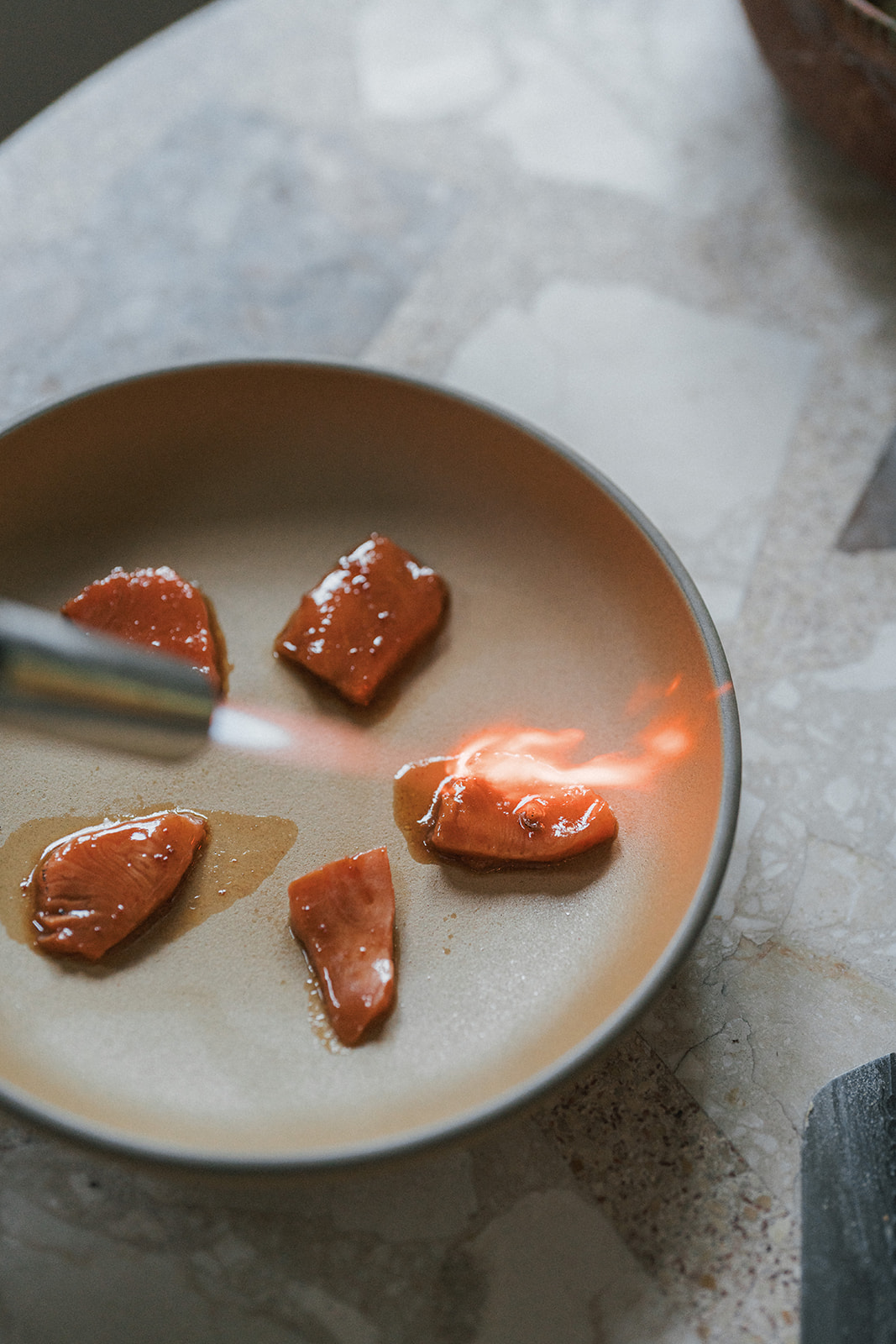 Image of Using a blowtorch or a hot pan, cook the salmon...