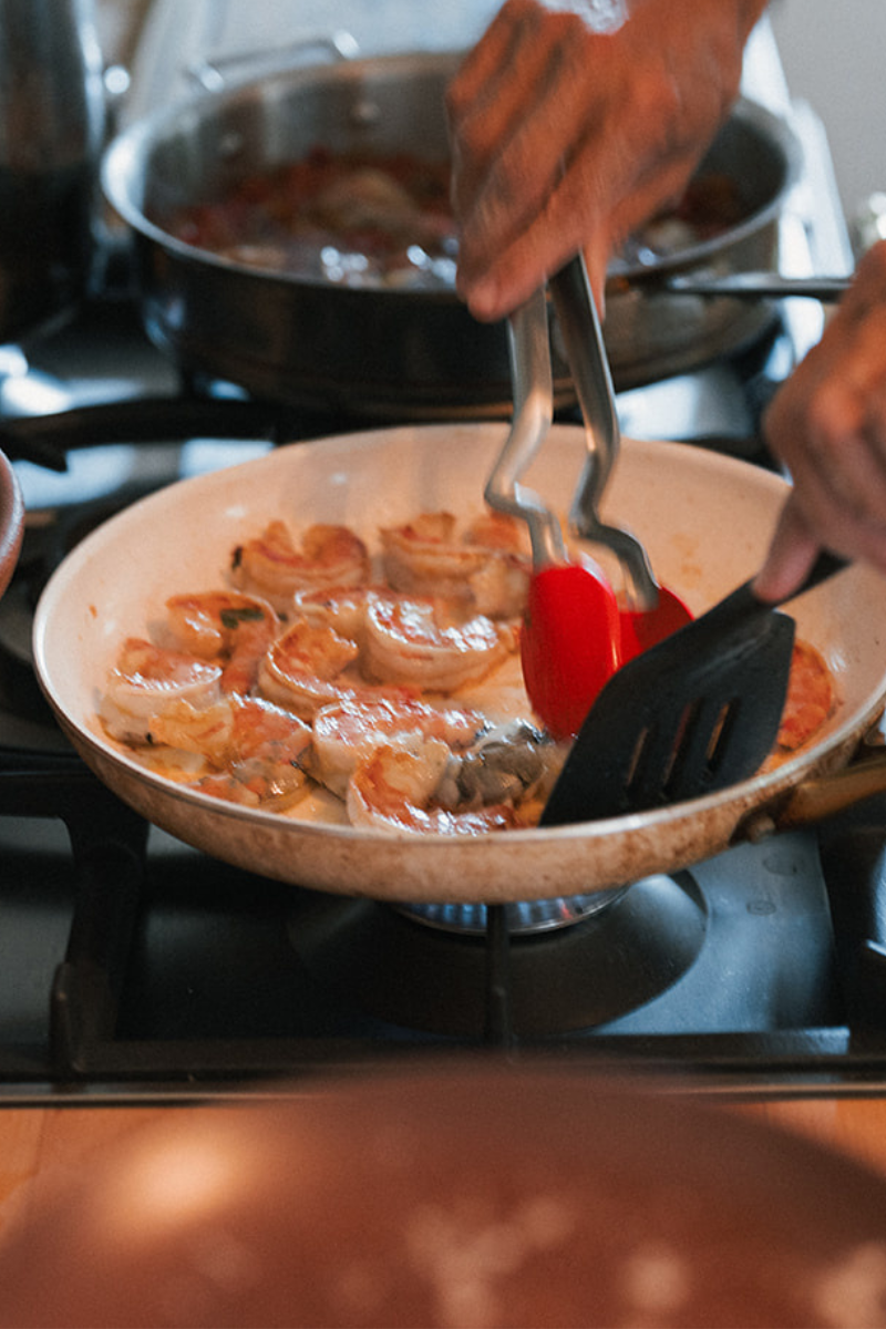 Image of Add the shrimp and scallops; cook until shrimp are pink...