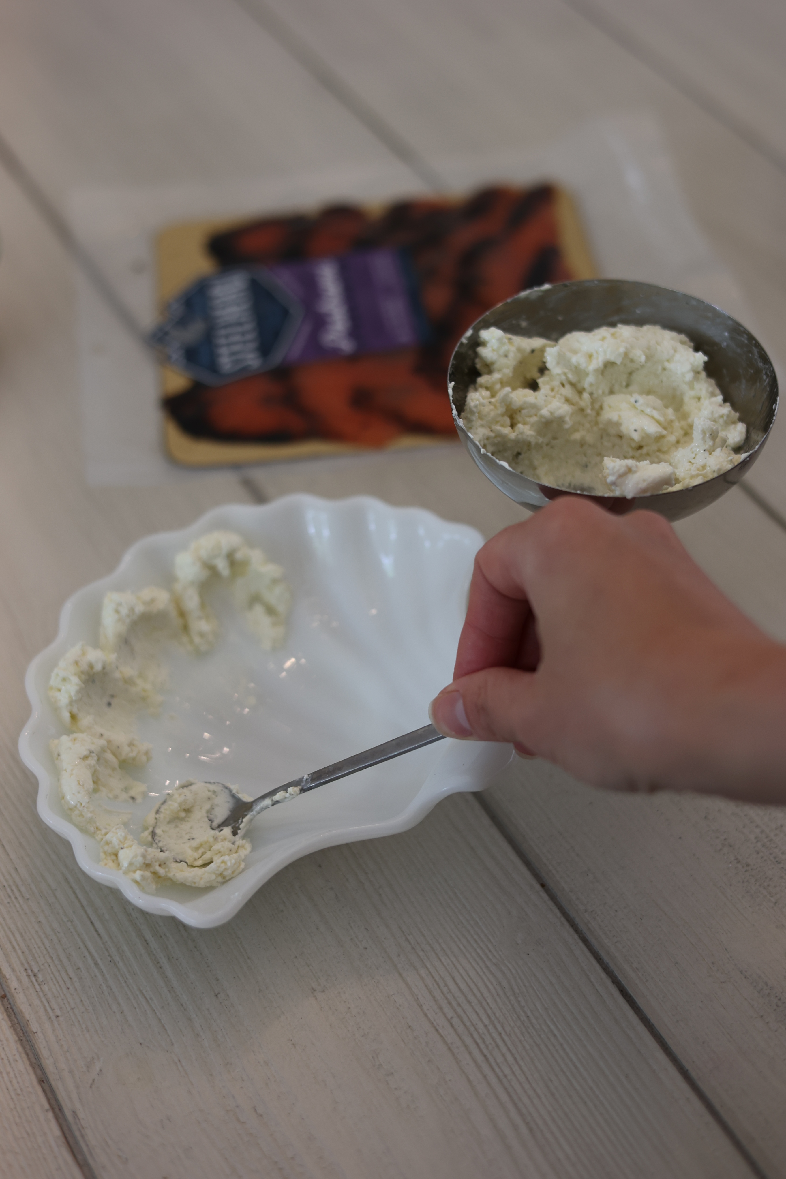 Image of Add generous dollops of whipped cream cheese to shallow serving...