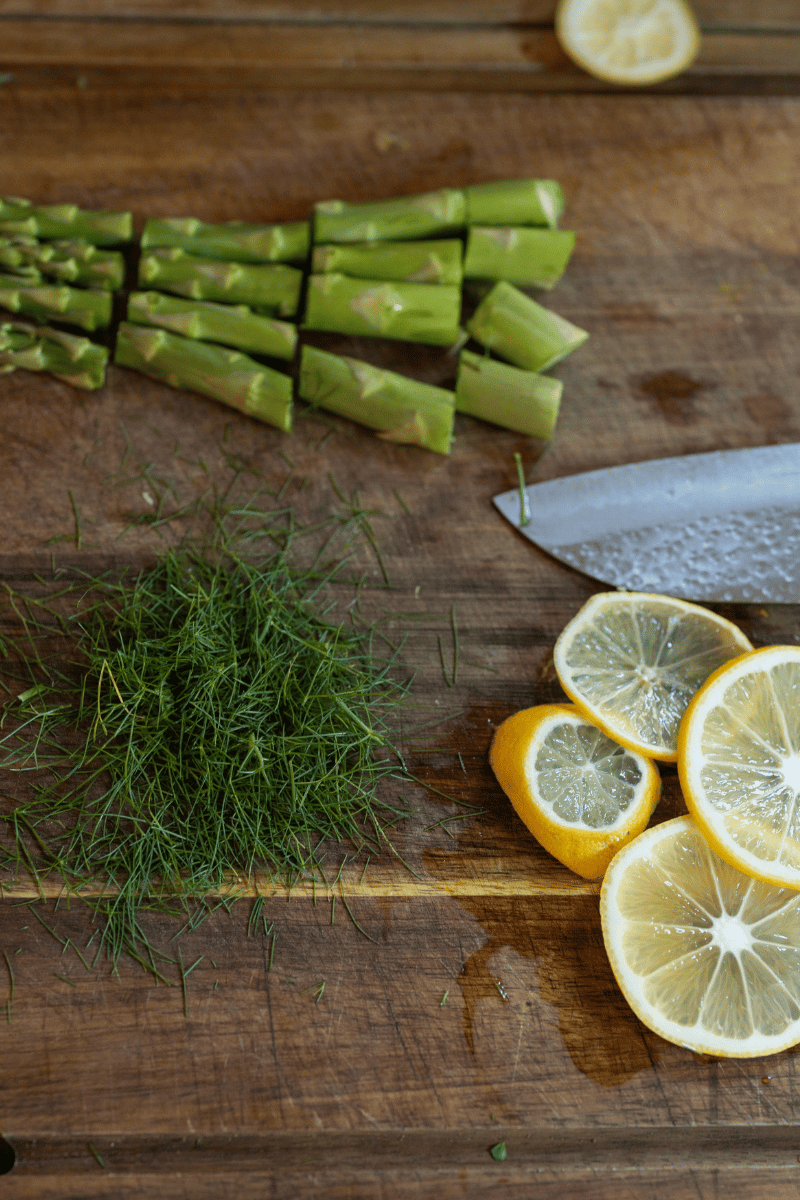 Image of Top each with a portion of asparagus.