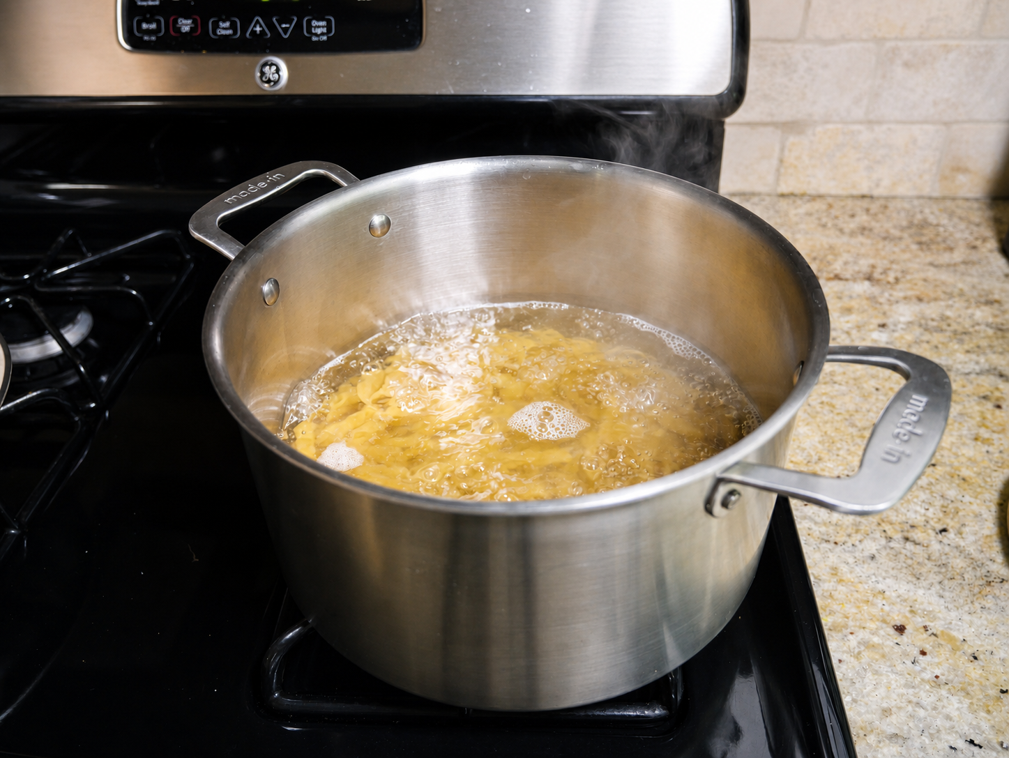 Image of Prepare the pasta. While the salmon and vegetables bake, cook...