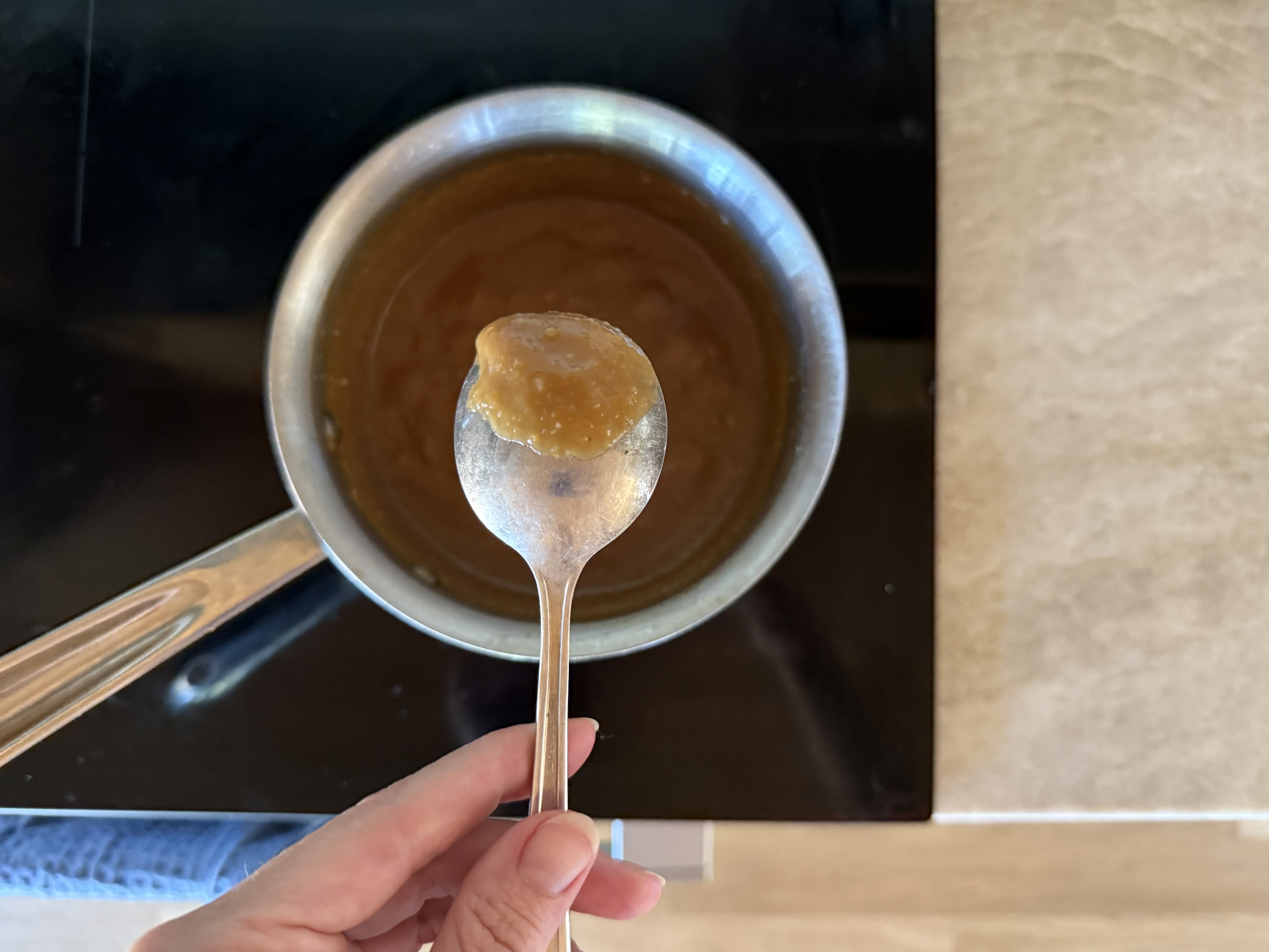 Image of In a medium saucepan, pour 1/2 cup of organic saké...