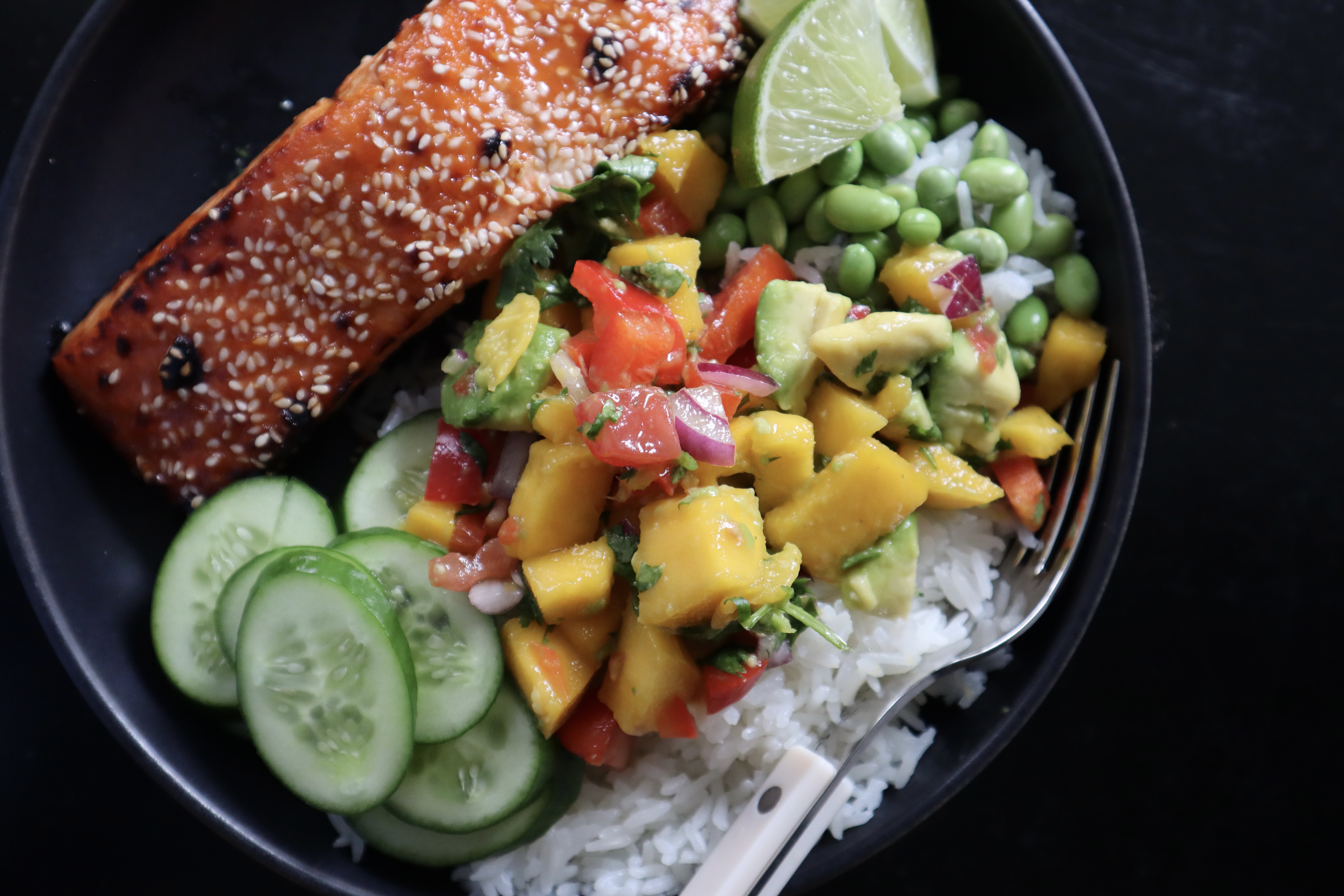 Image of Divide the coconut rice among bowls. Top with the hot...