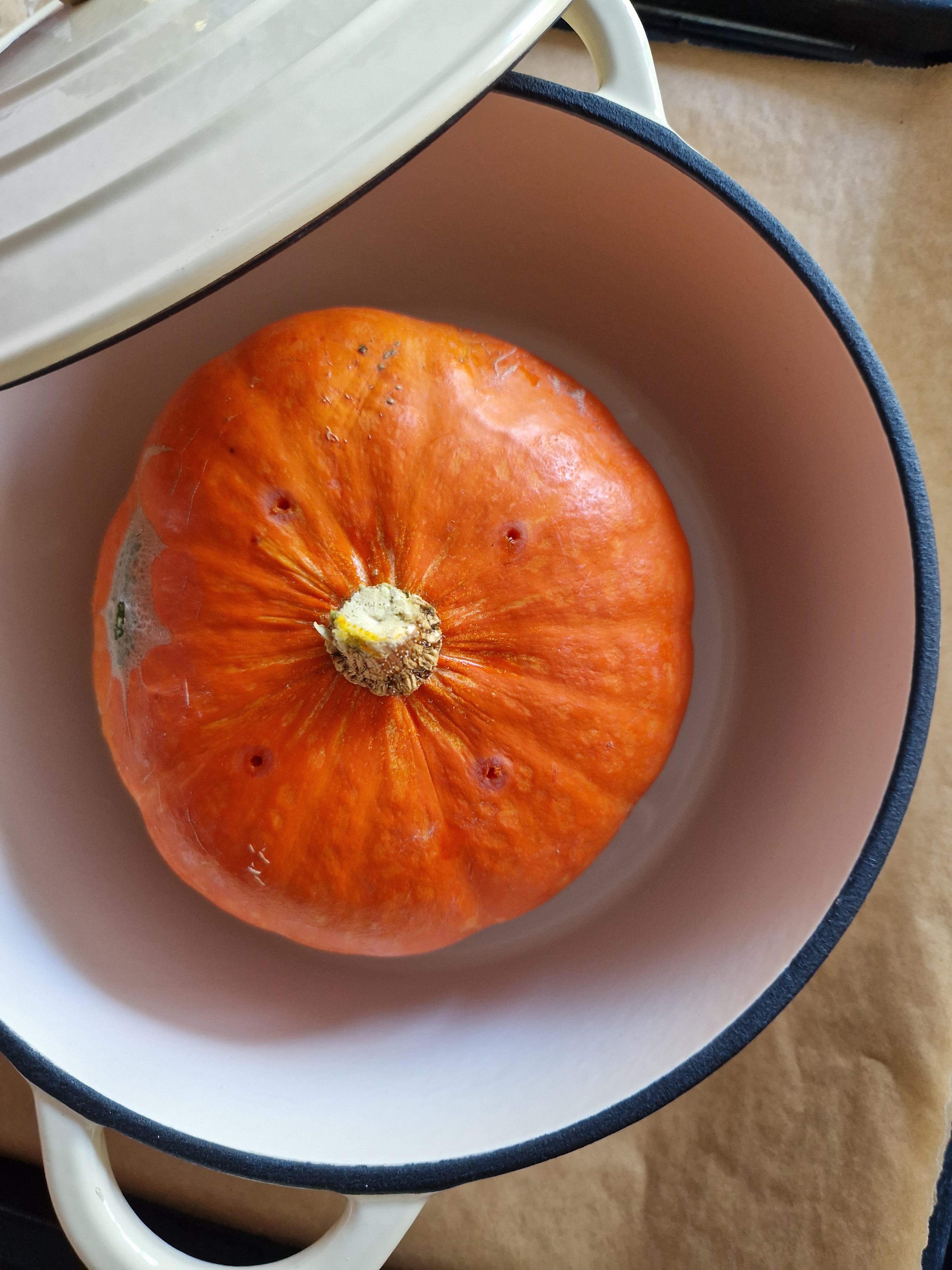 Wash the pumpkin and prick it a few times with...