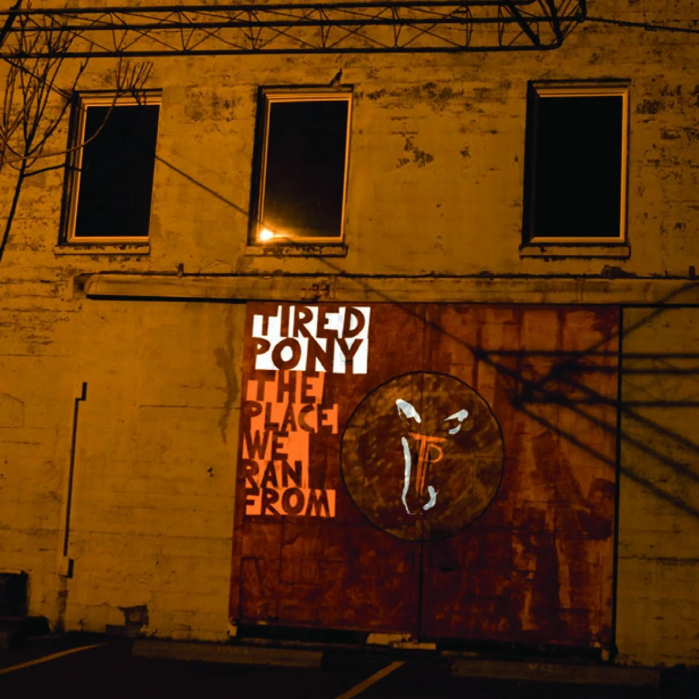 Official album cover art for the release The Place We Ran From by Tired Pony