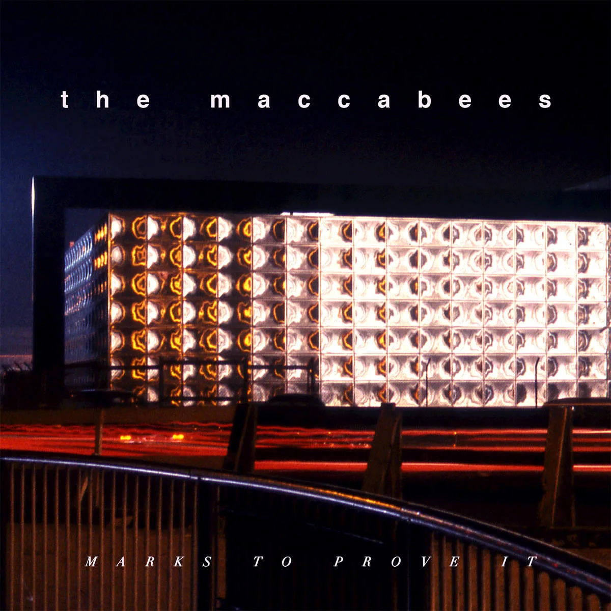 Official album cover art for the release Marks to Prove It by The Maccabees