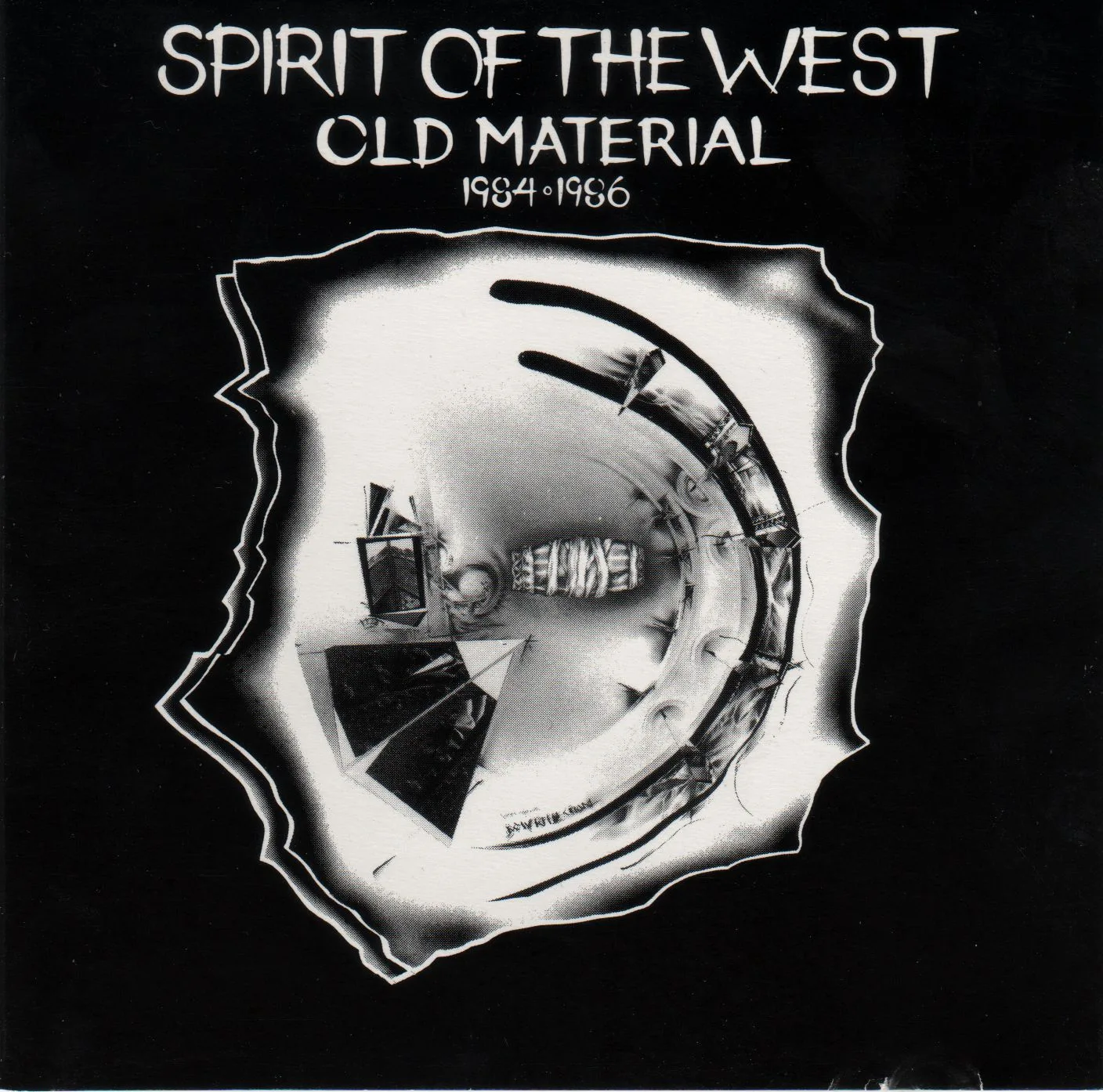Official album cover art for the release Old Material 1984 - 1986 by Spirit of the West