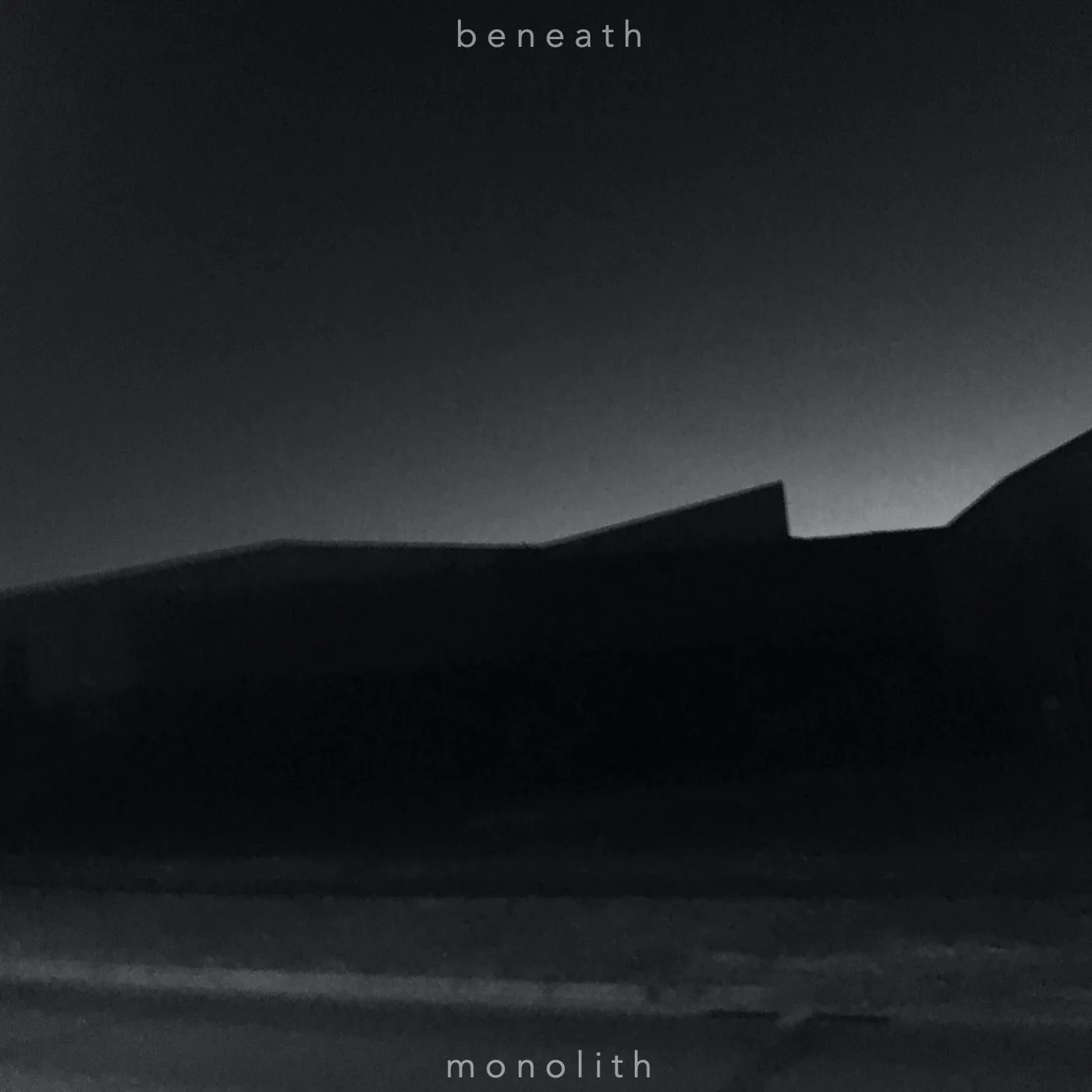 Official album cover art for the release Monolith by Beneath