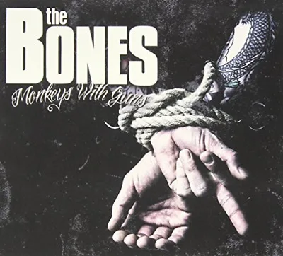 Official album cover art for the release Monkeys With Guns by The Bones