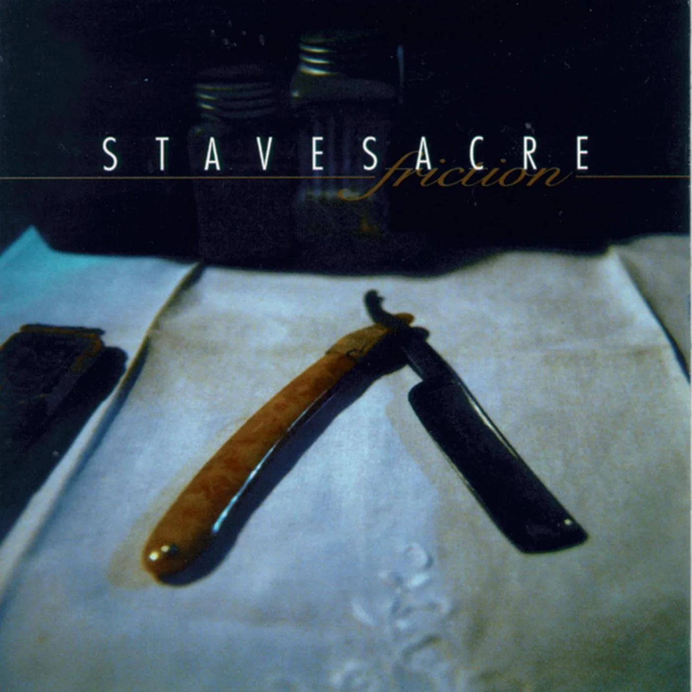 Official album cover art for the release Friction by Stavesacre