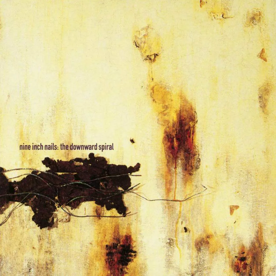 Piggy song track artwork featured on the album The Downward Spiral by Nine Inch Nails
