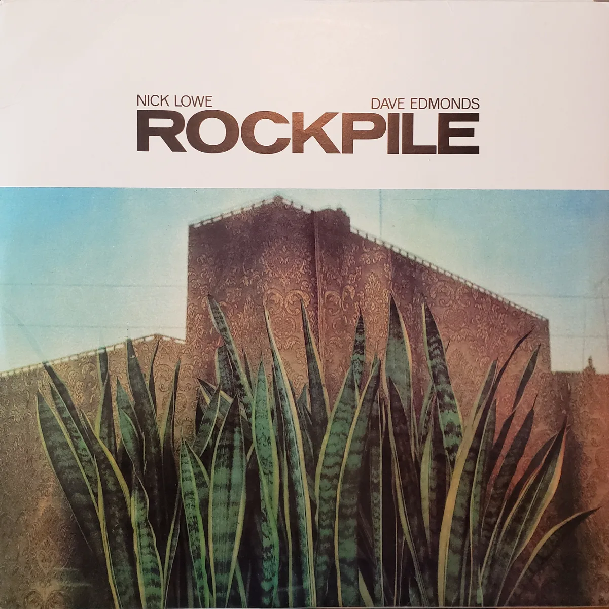 Official album cover art for the release Down Down Down by Rockpile