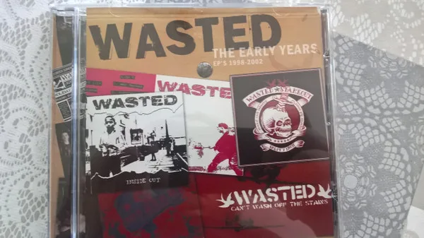 Official album cover art for the release the early years by Wasted