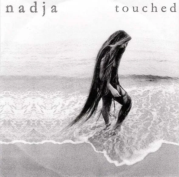 Official album cover art for the release Touched by Nadja