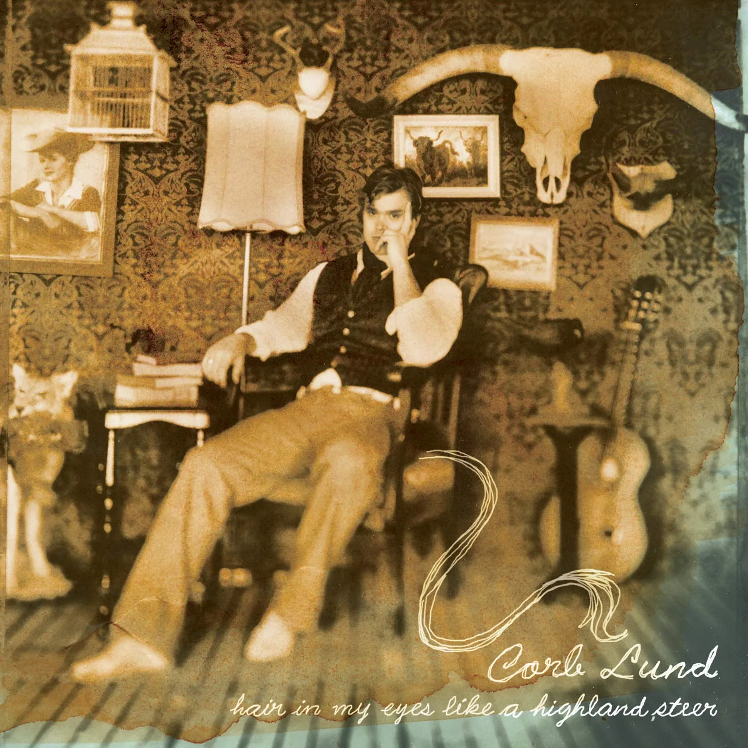 Official album cover art for the release Hair in My Eyes Like a Highland Steer by Corb Lund and the Hurtin’ Albertans