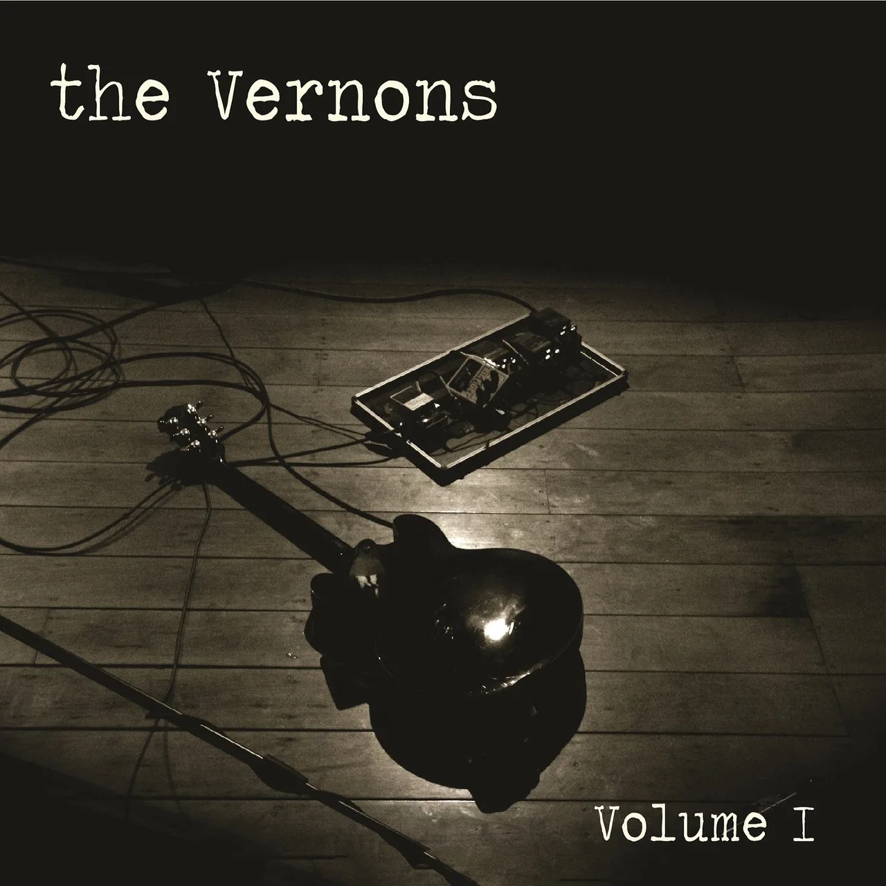 Official album cover art for the release Volume I by The Vernons