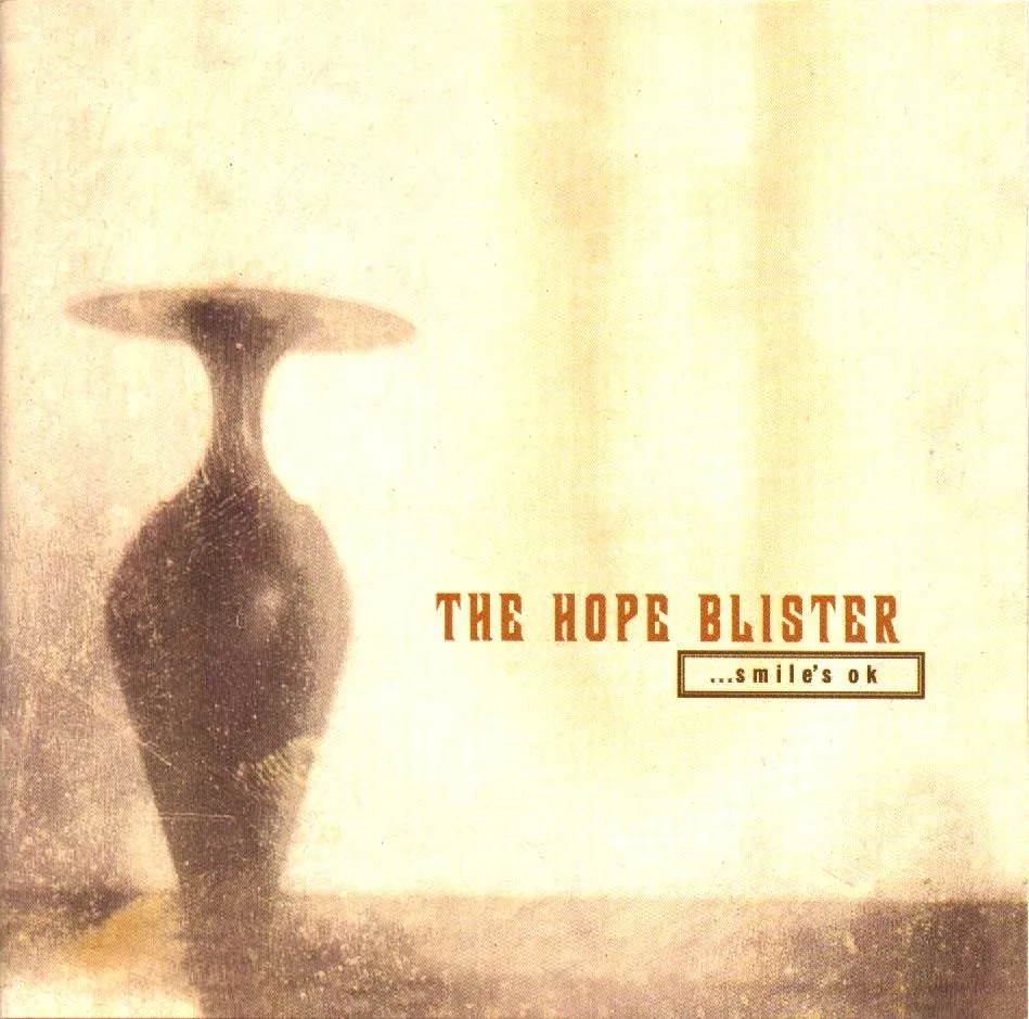 Official album cover art for the release …Smile’s OK by The Hope Blister