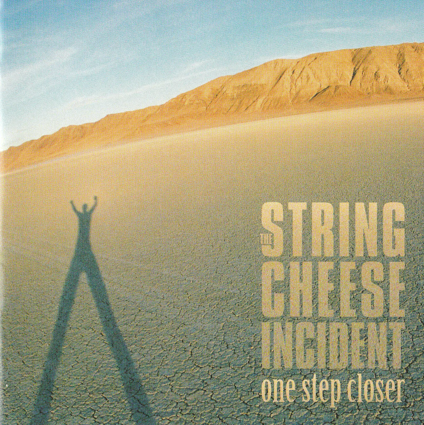 Official album cover art for the release One Step Closer by The String Cheese Incident