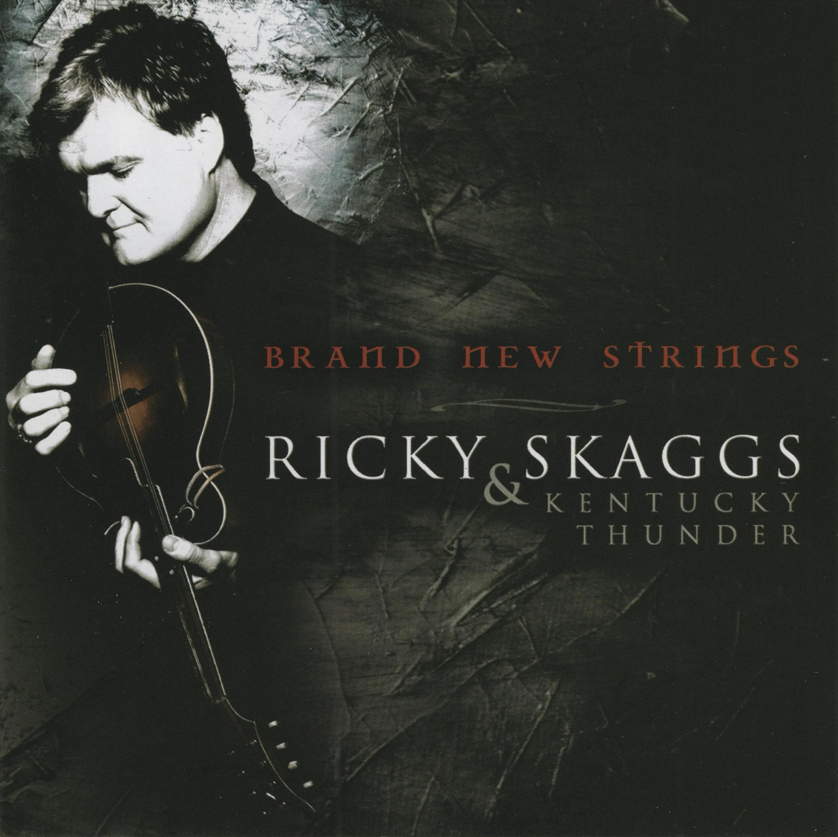 Official album cover art for the release Brand New Strings by Ricky Skaggs and Kentucky Thunder