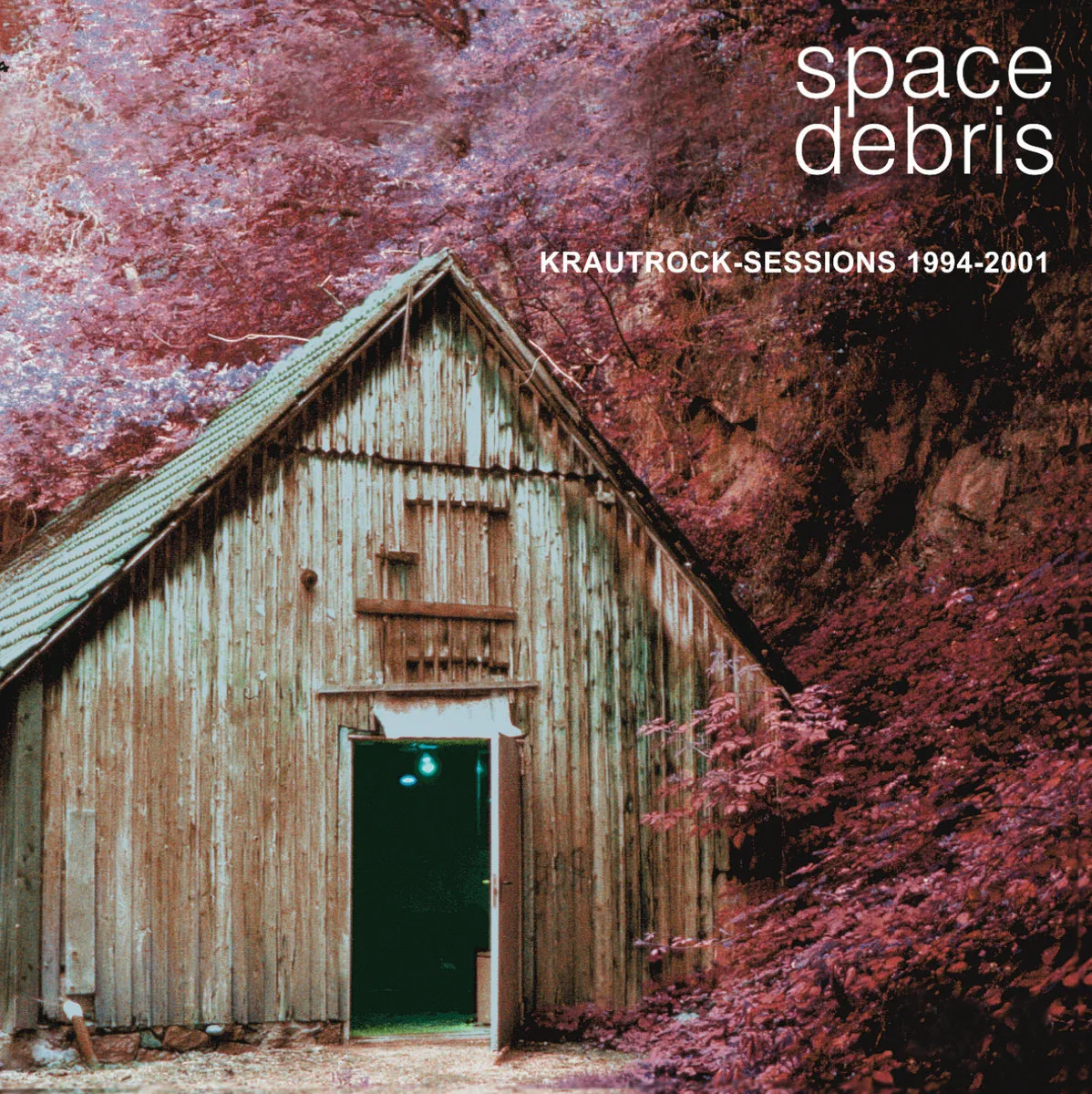 Official album cover art for the release Krautrock‐Sessions 1994–2001 by Space Debris