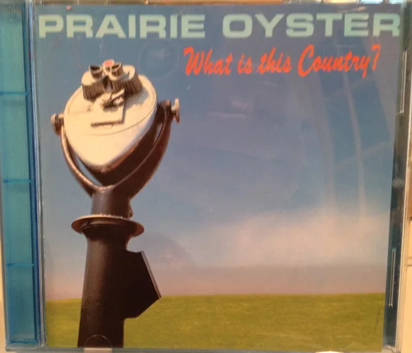 Official album cover art for the release What Is This Country by Prairie Oyster