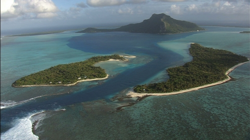 Beautiful aerial shot of the pass of Maupiti in French Polynesia