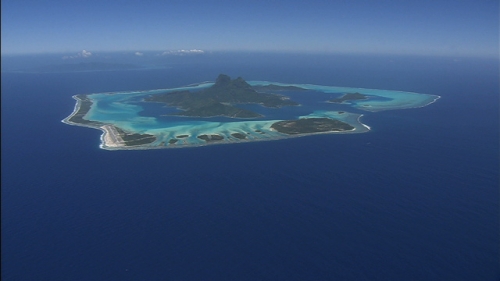 Aerial shot of the island and lagoon of Bora Bora in French Polynesia