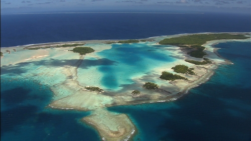 Aerial shot of the blue Lagoon of Rangiroa, atoll of Tuamotus in French Polynesia