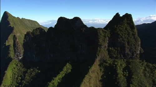 Beautiful aerial shot passing over the Mount Diadème, said the Diadème, view on Pirae, Island of Tahiti in french Polynesia