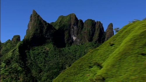 Cinematic Aerial Shot of the Mount Diadème, coming from the valley of Pirae, island of Tahiti in french Polynesia