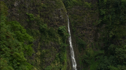 Aerial shot of a water fall in the valley Taipivai of Nuku Hiva, Marquesas islands in french Polynesia