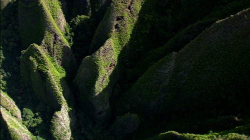 Cinematic vertical aerial shot of mountain of Hakaui valley, Nuku Hiva island, Marquesas archipelago in french Polynesia