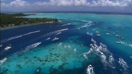 Aerial shot of the arrival of canoes of Hawaikinui Vaa