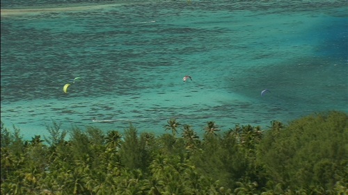Aerial shot of kite surfers in the lagoon of Moorea, Society islands in french Polynesia