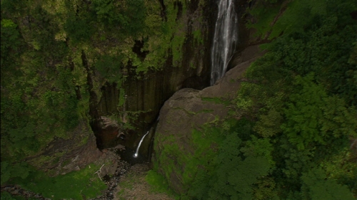 Nuku Hiva, aerial shot of the waterfall of Hakaui valley, Marquesas islands archipelago