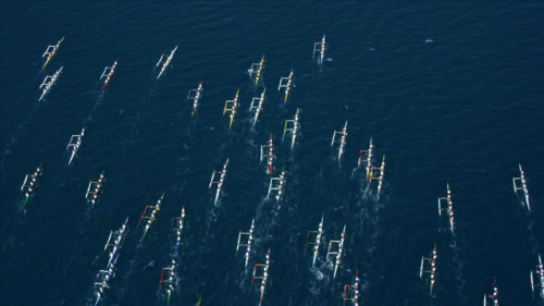 4K UHD, Hawaiki Nui, Aerail view of Polynesian canoe race on the South Pacific Ocean