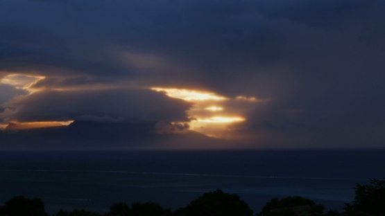 Moorea, panoramic view of sunset on the Island, shot from Tahiti