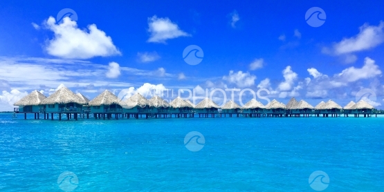 Overwater bungalows in the beautiful lagoon of Bora Bora