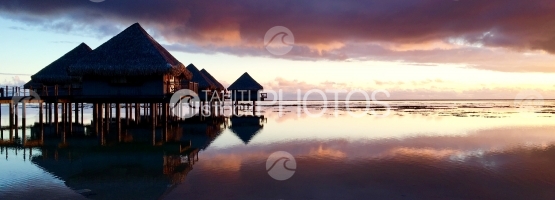 Moorea, Panoramic view of Overwater bungalows during sunset