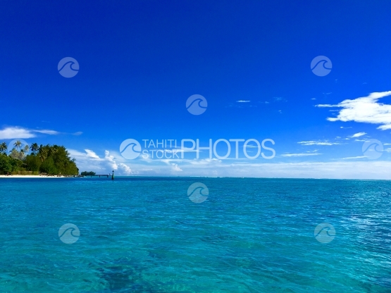 Lagoon of Moorea under blue sky