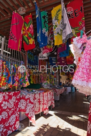 Tahiti, Colored pareos and dresses at the market of Papeete