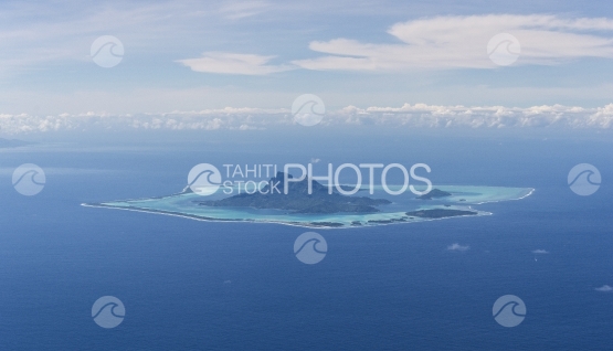 Island of Bora Bora and ocean, aerial view