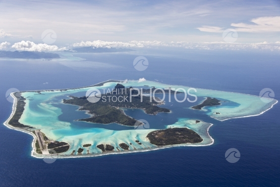 Aerial view of the island Bora Bora and the pass
