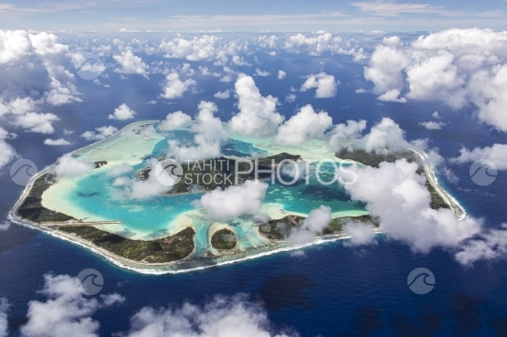Maupiti, aerial view of the island and clouds
