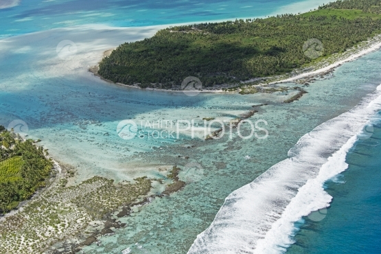 Maupiti, Aerial view of the lagoon and turquoise water by the ocean