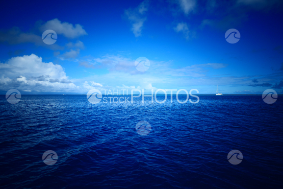 Sailing boat in the lagoon of Huahine