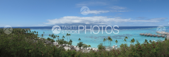 Coast line of Moorea, panoramic view on the lagoon and a luxurious hotel