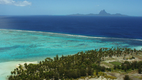 Tahaa, aerial view of the island Bora Bora, and the ocean