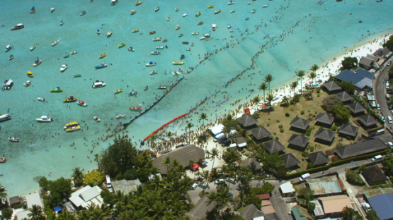 Bora Bora, aerial view of the finish of Hawaikinui paddle race in the lagoon